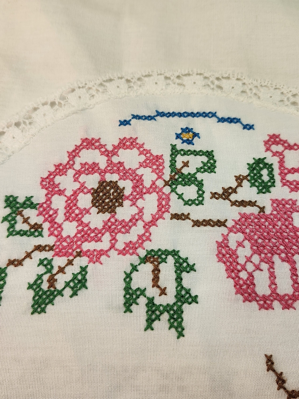 Hand-Embroidered Floral Linen Accent in Pink and Green
